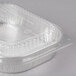 A Durable Packaging silver aluminum foil container with a clear plastic lid.