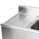 An Eagle Group stainless steel underbar sink with two drains.