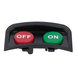 A black and green round push button with white letters that says off.