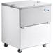 An Avantco stainless steel rectangular milk cooler on wheels with a white background.