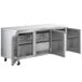 An Avantco stainless steel undercounter refrigerator with two doors open.