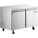 An Avantco stainless steel undercounter freezer with wheels.