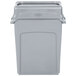 A Rubbermaid grey plastic trash can with a lid.