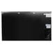 An Avantco black rectangular back bar refrigerator with solid doors.