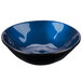 A close-up of a blue GET Cosmo melamine bowl with a black rim.