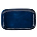 A blue rectangular melamine platter with a dark blue rim.