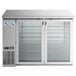 A stainless steel Avantco back bar refrigerator with narrow glass doors.