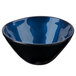 A close-up of a blue bowl with a black rim.