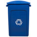 A blue Rubbermaid Slim Jim recycling bin with a white recycle symbol and white arrows.