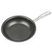 A close-up of a silver Vollrath non-stick frying pan with a white background.