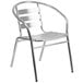 A silver Flash Furniture outdoor restaurant chair with a triple slat back.