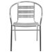 A silver Flash Furniture aluminum outdoor restaurant chair with a triple slat back.