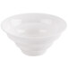 A CAC bone white porcelain bowl with a white background.