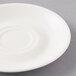 A white Arcoroc porcelain saucer with a circular rim.