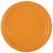 A close-up of a Creative Converting Pumpkin Spice Orange paper plate.