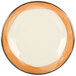 A white plate with a wide white rim and a Kanello orange edge.