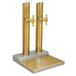 A Micro Matic Skyline brass beer tap tower with two gold beer taps.