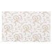 A white glassine pad with gold floral pattern.