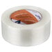A roll of white Shurtape fiberglass reinforced strapping tape with an orange label.
