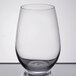 A close up of a clear Libbey stemless wine glass.