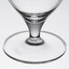 A close-up of a clear Libbey Reserve Neo wine goblet with a small rim.