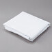 A folded white Intedge table cover.