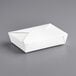 A white folded paper take-out box with a folded lid.