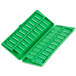 A green plastic box with many small squares inside.