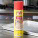 A yellow can of PAM baking spray on a counter.