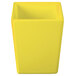 A yellow rectangular Tablecraft bowl with straight sides.