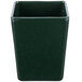 A hunter green square container with white speckles and a lid.