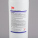 A white 3M container with a black and red label for a 3M Water Filtration Products ScaleGard Blend Series Filter Cartridge.