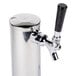 A silver metal Avantco beer tap tower with a black handle on a counter.