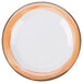 A close up of a GET Kanello white melamine plate with a white rim and an orange border.