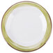 A Kanello white melamine plate with a wide rim and green and brown border.
