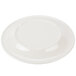 A white plastic Kanello melamine plate with a wide circular ivory rim with a Kanello orange edge.