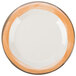 A white plate with a wide rim and orange trim.