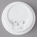 A white plastic Choice hot cup travel lid with a hinged tab.