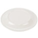 A white Kanello melamine plate with a round edge and a Kanello green rim.