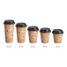 A row of brown paper coffee cups with black lids.