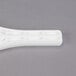 A white plastic C Pure AQUAKING WRENCH20 filter wrench with a handle.