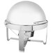 A Vollrath Avenger round chafing dish with a metal base and silver lid.
