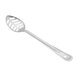 A close-up of a Vollrath slotted stainless steel basting spoon with a white background.