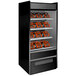 A black Structural Concepts heated display case with orange shelves holding food.