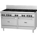 A large stainless steel Garland commercial gas range with four burners, a griddle, and two ovens.