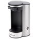 A Conair Cuisinart single cup coffee maker with a silver and black lid and base.