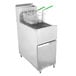 A Dean stainless steel gas floor fryer with green handles and baskets.