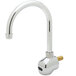A silver Equip by T&S wall-mounted sensor faucet with a gold handle.