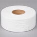 A Lavex Premium jumbo roll of white toilet paper.
