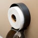 A Lavex Premium jumbo toilet paper roll on a holder.